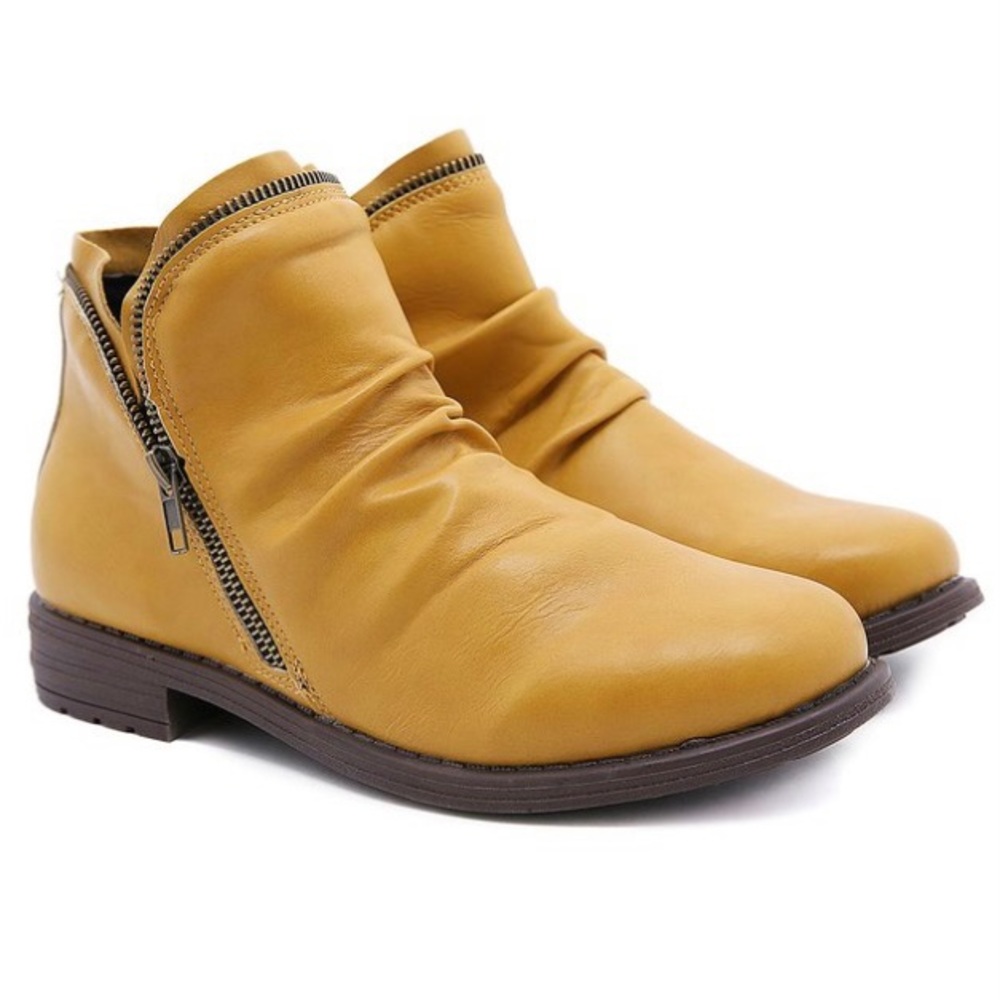 Short mustard slouchy boots.